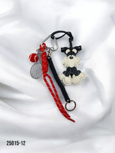 Llavero perrito tenis