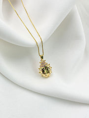 Collar mariquita dorado