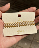 Pulsera Miyuki Flecha blanca