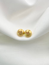 Arete topo corazón dorado