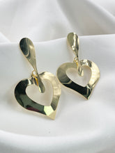 Arete topo corazón dorado