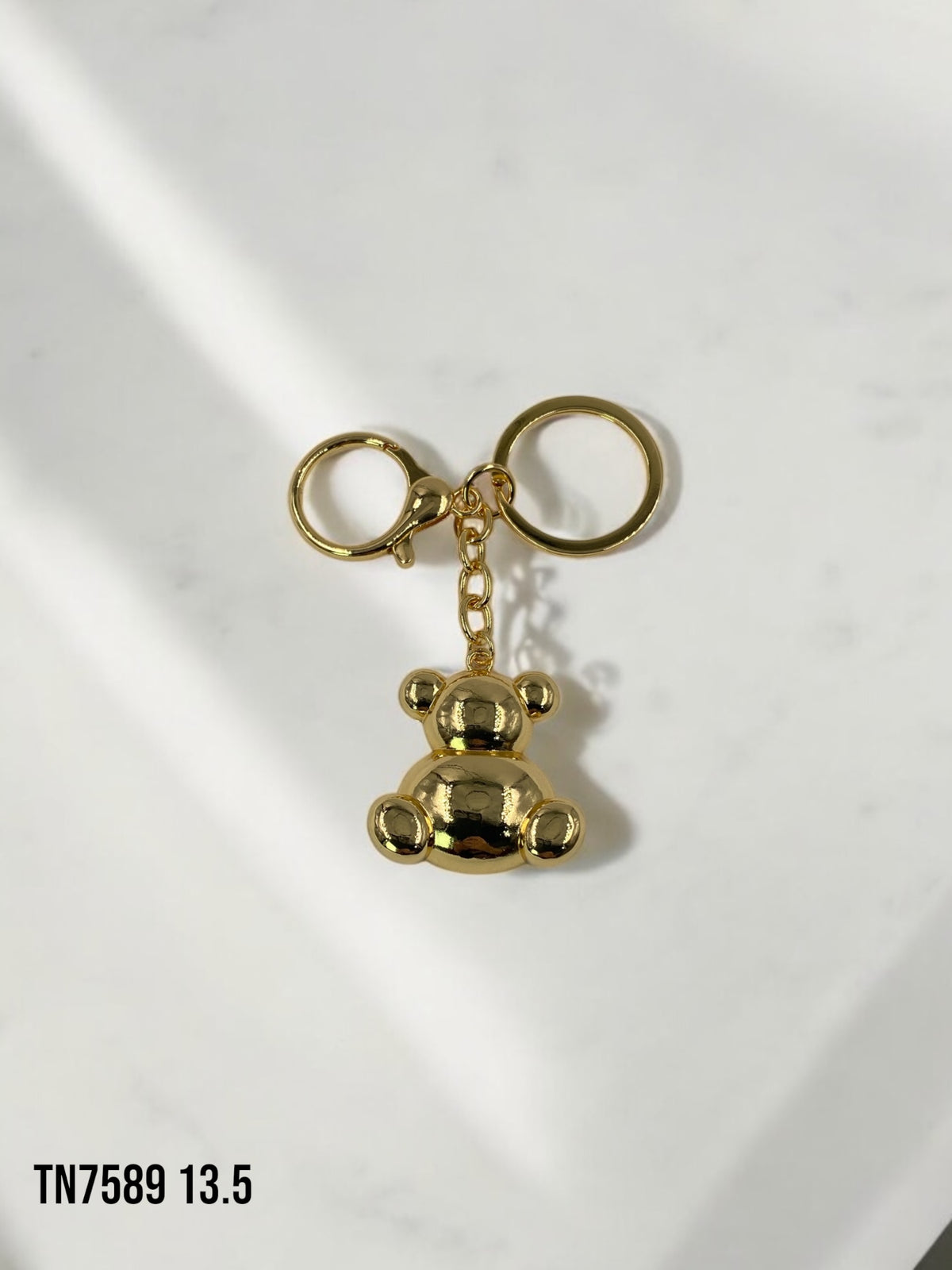 Llavero osito dorado