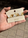 Pulsera Miyuki Corazones dorados