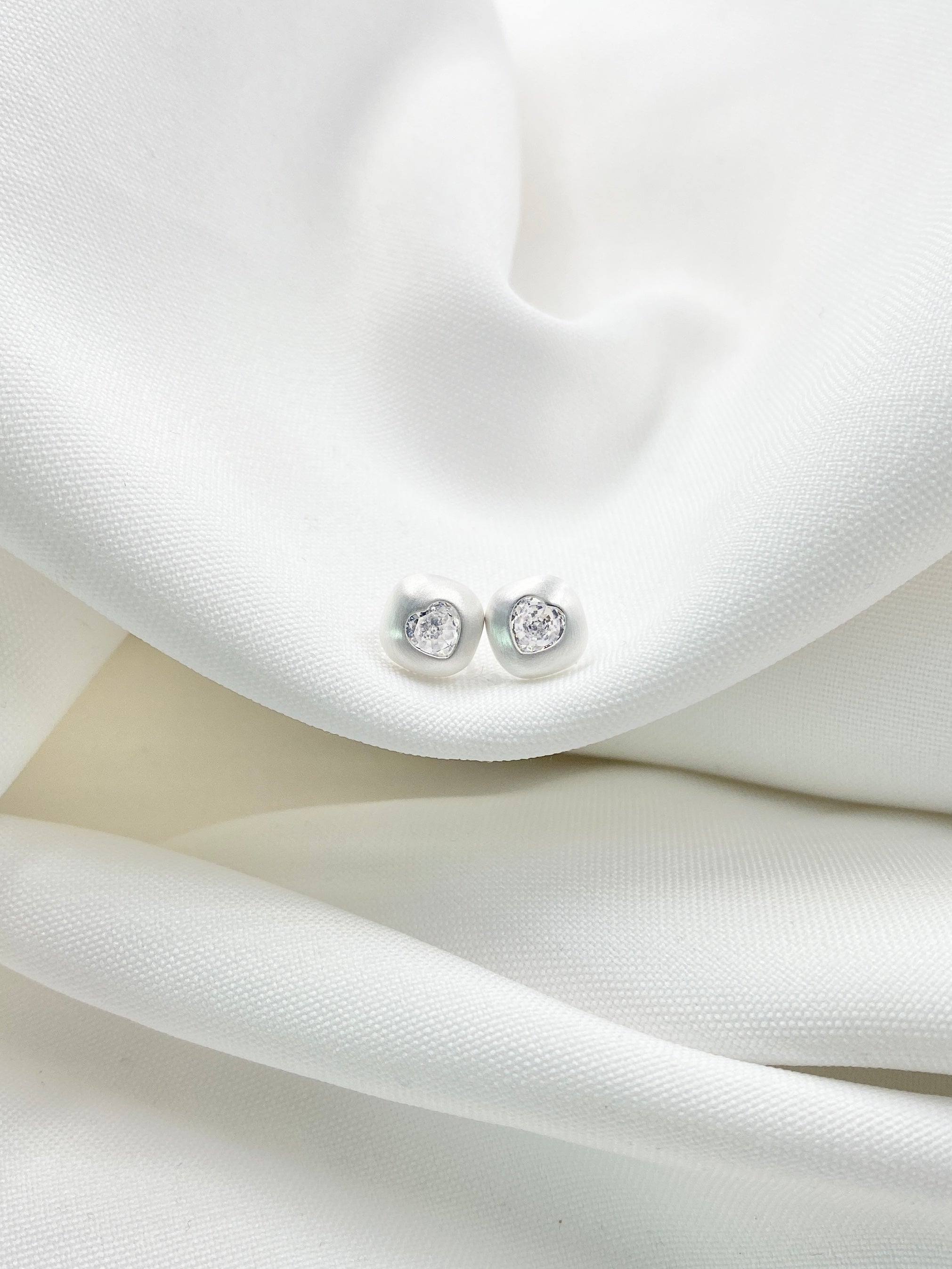Arete topo Linnea plateado