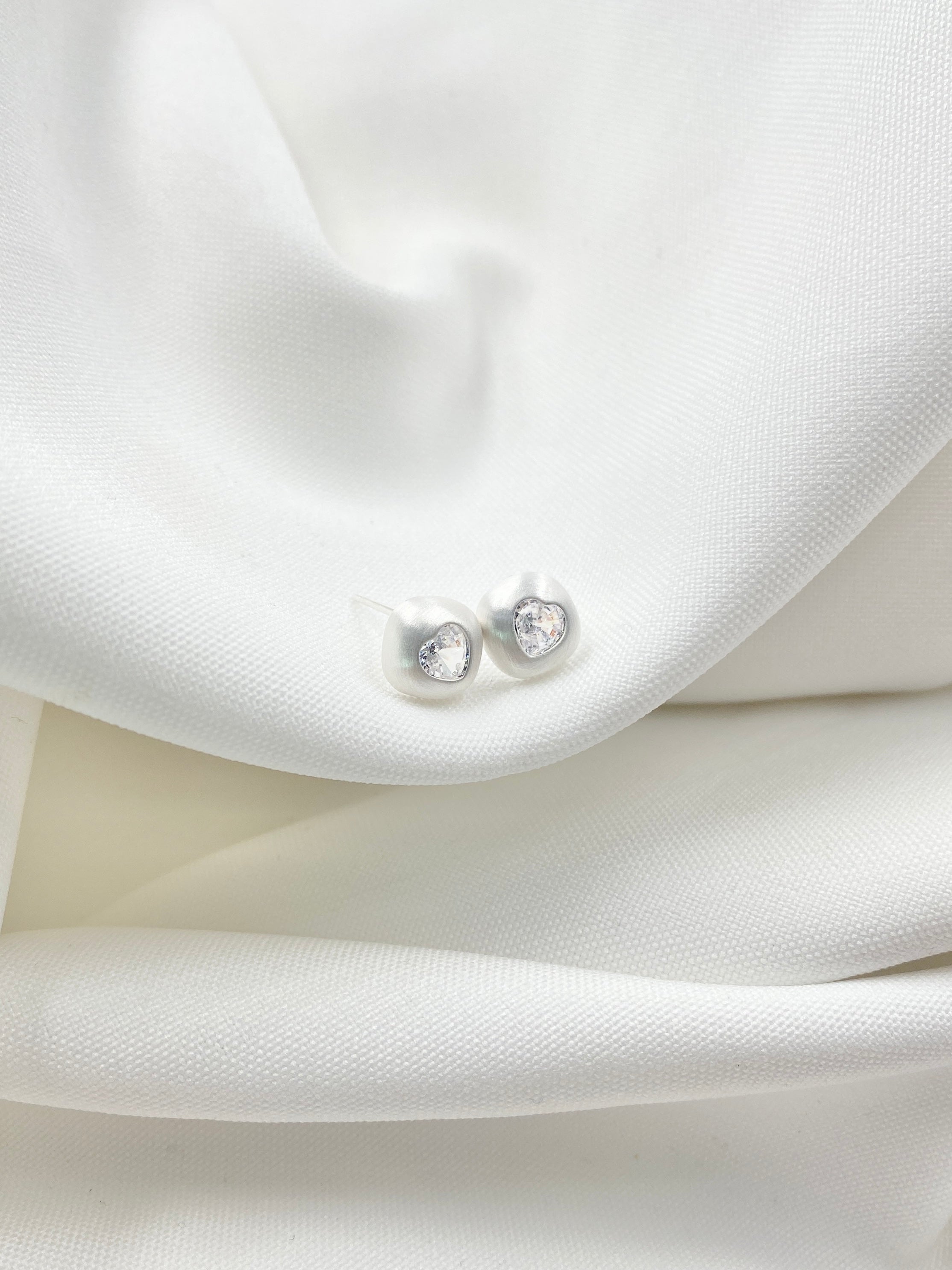Arete topo Linnea plateado