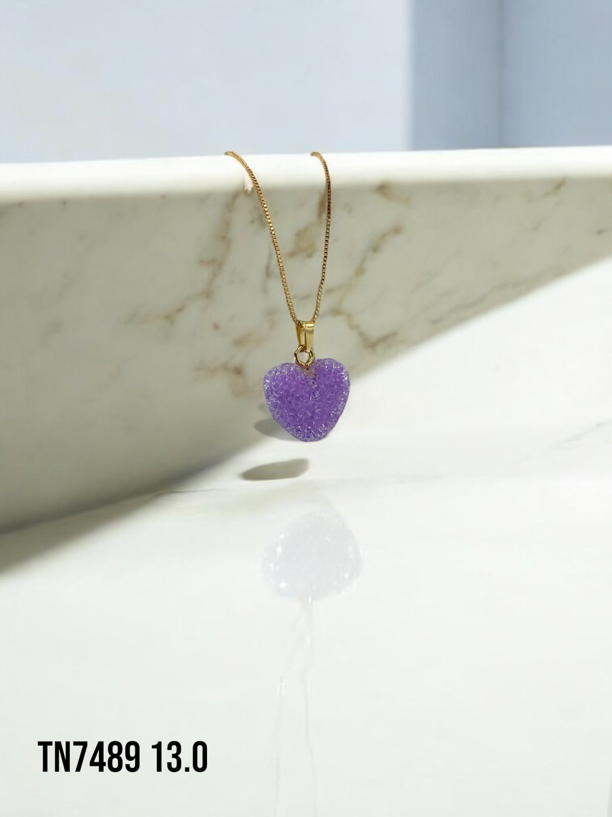 Collar corazón morado