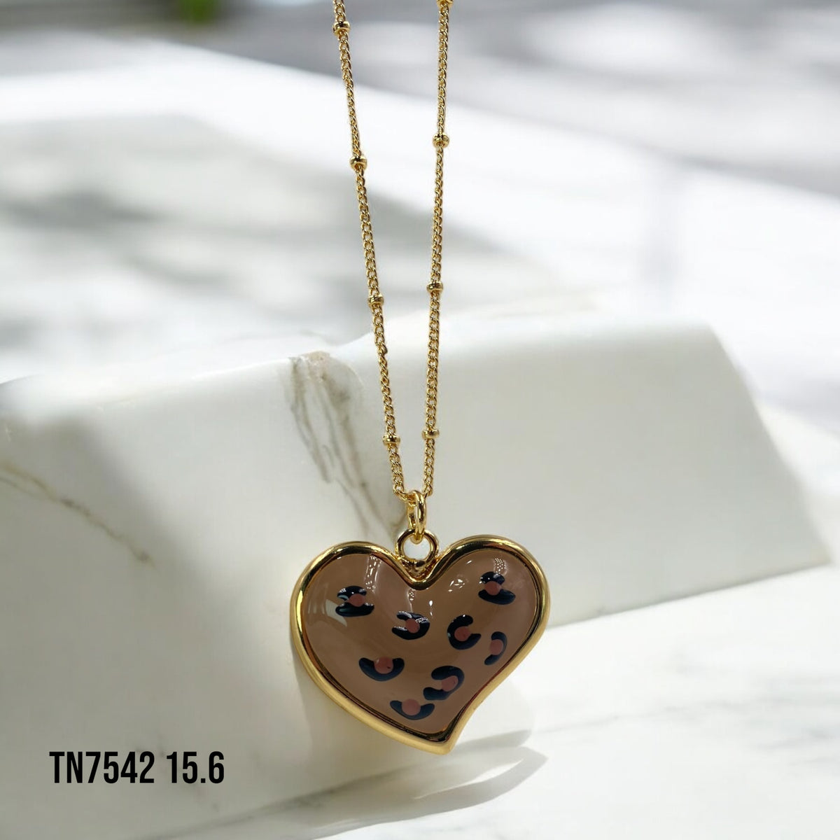 Collar corazón animal print miel