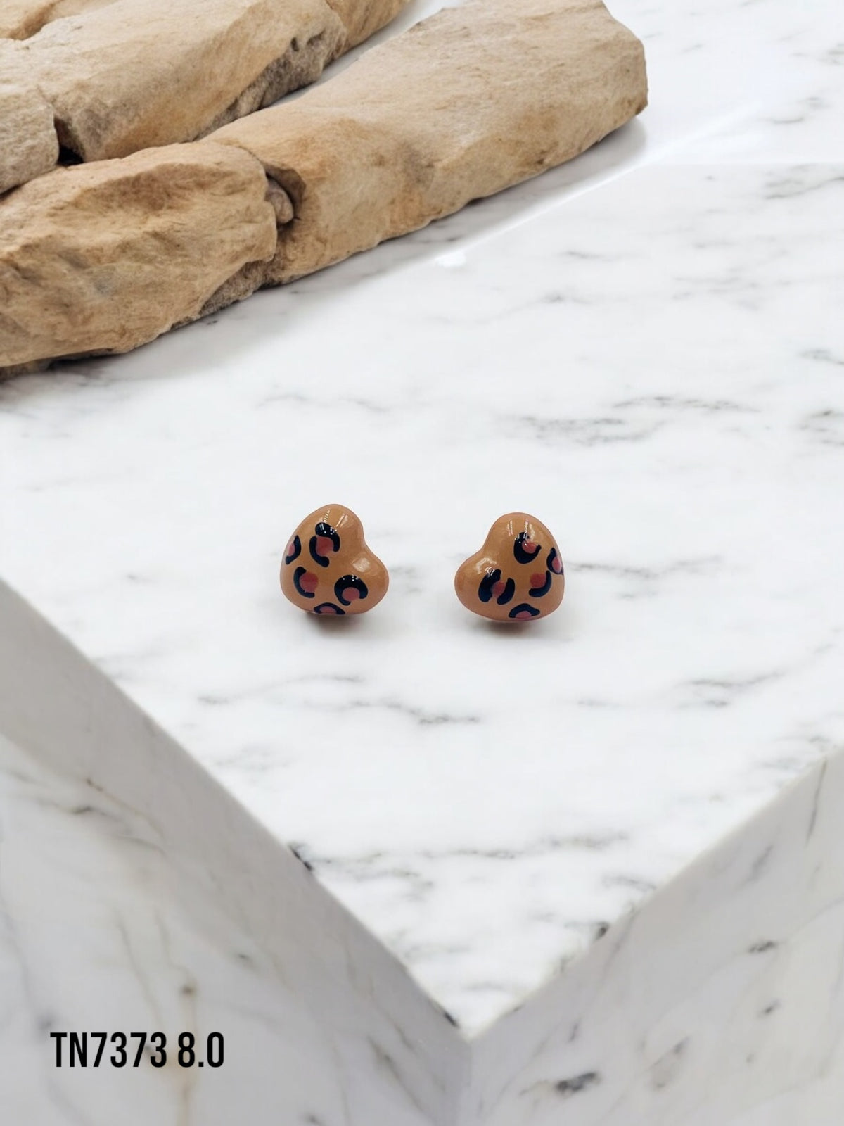 Arete topo Safari Chic